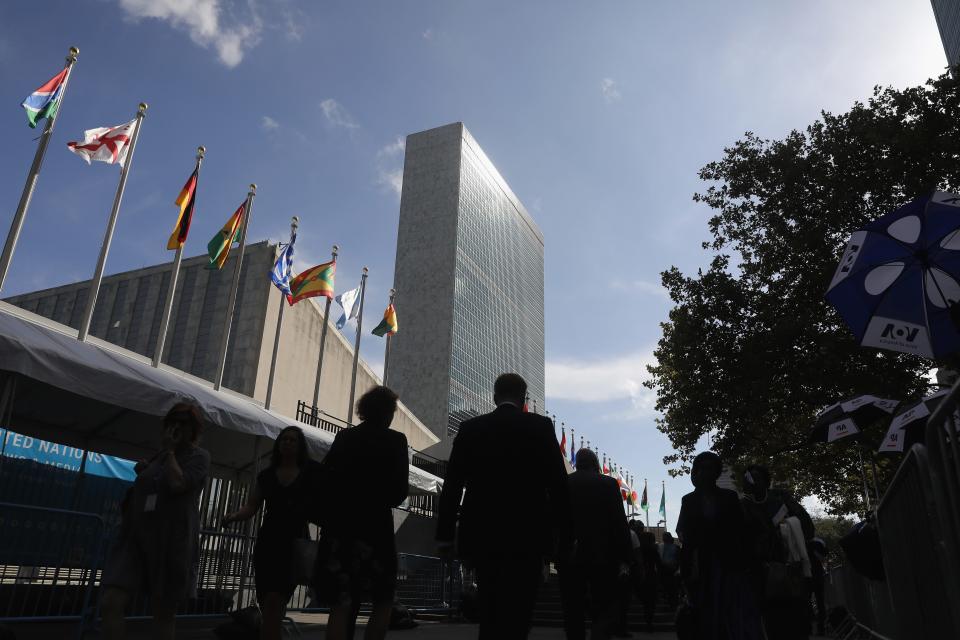 NEW YORK, NY - SEPTEMBER 26:  People walk past the United Nations headquarters on September 26, 2018 in New York City. World leaders gathered for the 73rd annual meeting at the UN headquarters in Manhattan.  (Photo by John Moore/Getty Images)