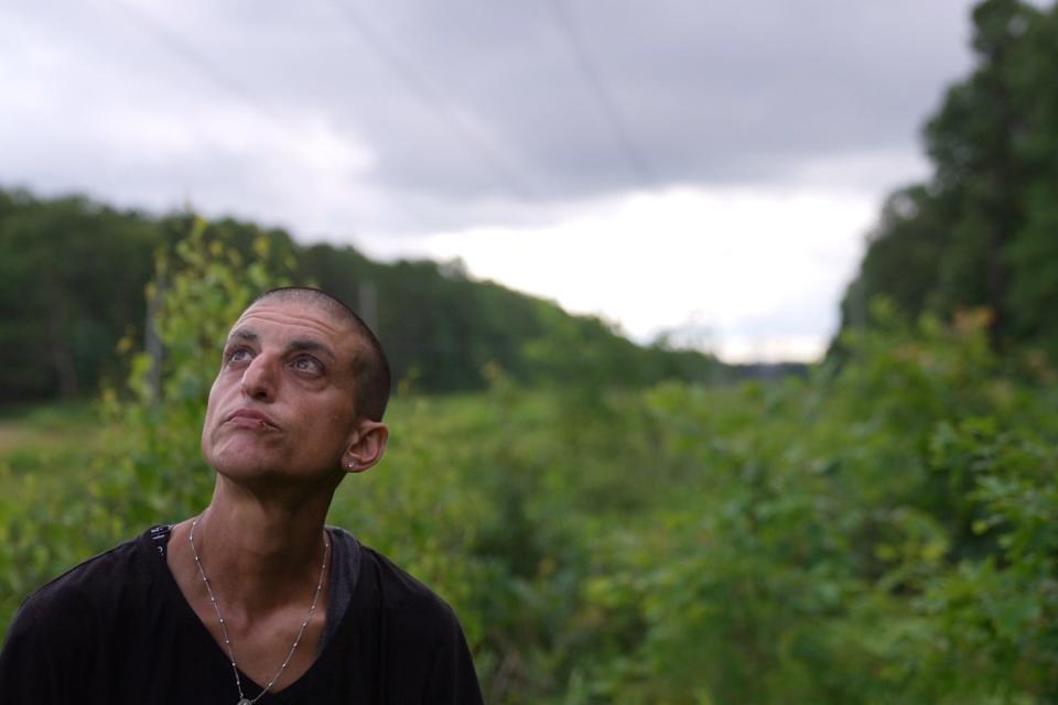 Since Shirin Stallings' release from incarceration in April, 2020, she has not had a stable place to live. Stallings stands among wild blueberry bushes in Atco on Thursday, July 7, 2022.