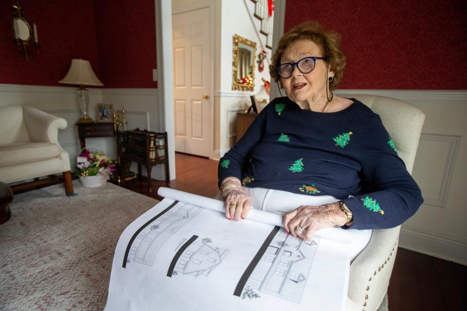 Helen Motzenbecker, 94, has spent her adult life trying to ensure people have affordable places to live. She has been willing to sue municipalities until they approve her plan for affordable housing units. Here in her Spring Lake home she shows plans for her latest project on Route 71 in Spring Lake Heights, NJ Thursday, December 22, 2022.