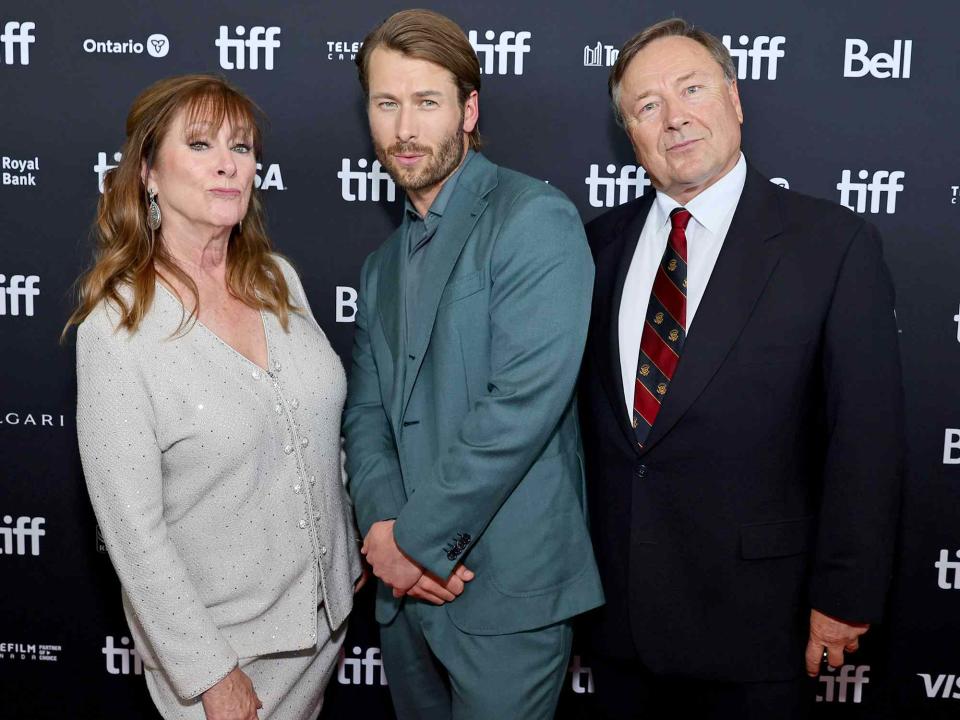 <p>Matt Winkelmeyer/Getty </p> yndy Powell, Glen Powell and Glen Powell Sr. attend the "Devotion" Premiere on September 12, 2022 in Toronto, Ontario. 