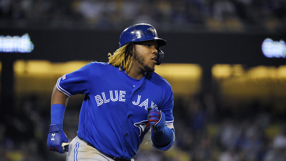Toronto Blue Jays' Vladimir Guerrero Jr. runs to first as he hits a solo home run during the sixth inning of a baseball game against the Los Angeles Dodgers Thursday, Aug. 22, 2019, in Los Angeles. (AP Photo/Mark J. Terrill)