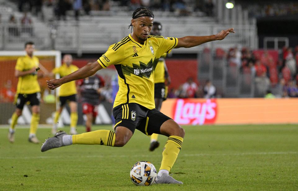 Sep 18, 2024; Toronto, Ontario, CAN; Columbus Crew forward Jacen Russell-Rowe (19) shoots the ball against Toronto FC in the first half at BMO Field. Mandatory Credit: Dan Hamilton-Imagn Images