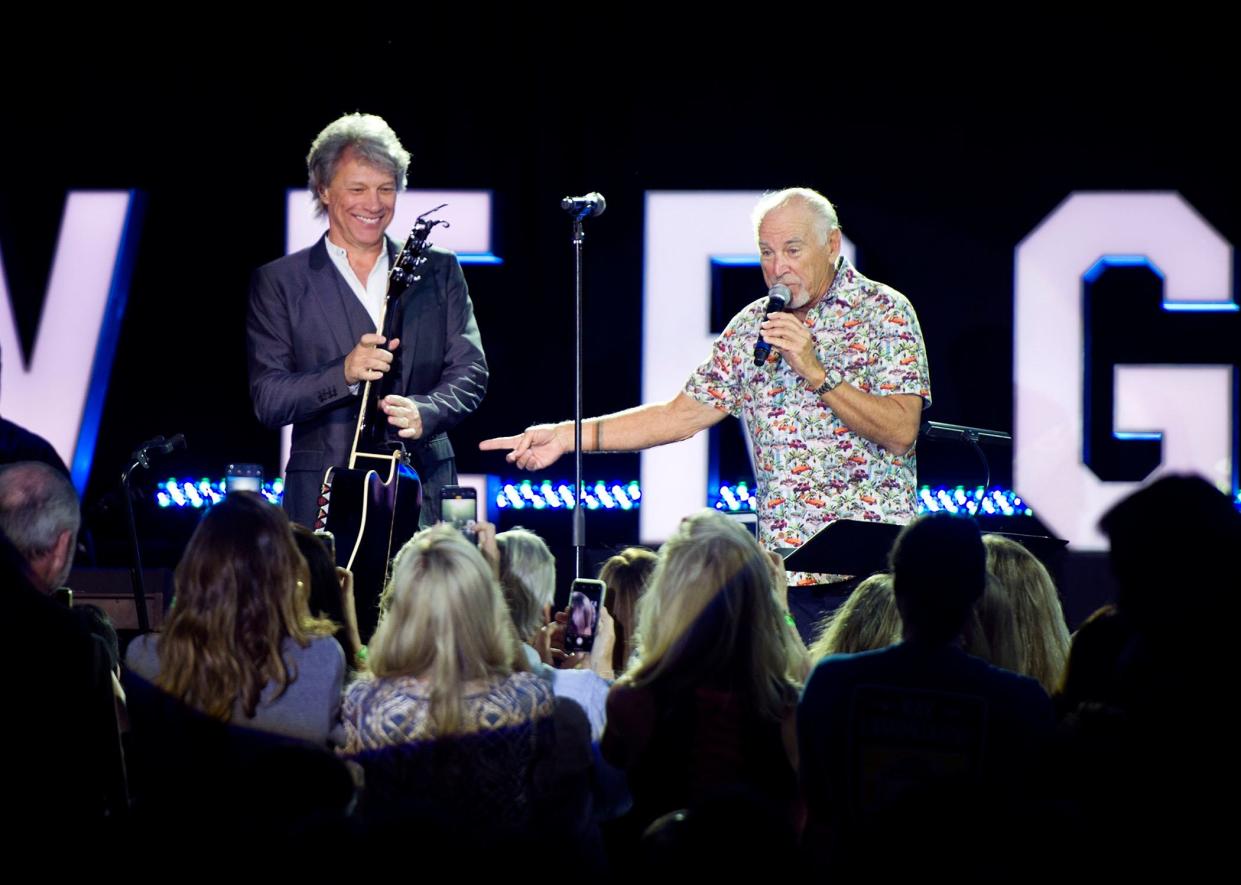 Jon Bon Jovi and Jimmy Buffett perform during the Everglades Foundation ForEverglades dinner dance at The Breakers Saturday February 16,  2019. 