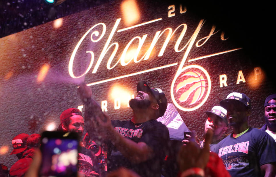 TORONTO, ON- JUNE 13 - Drake celebrates as Toronto fans gather in Jurassic Park to watch the Raptors play the Golden State Warriors in game six and win the NBA Finals at Oracle Arena in Oakland ouside of Scotiabank Arena in Toronto. June 13, 2019. (Steve Russell/Toronto Star via Getty Images)