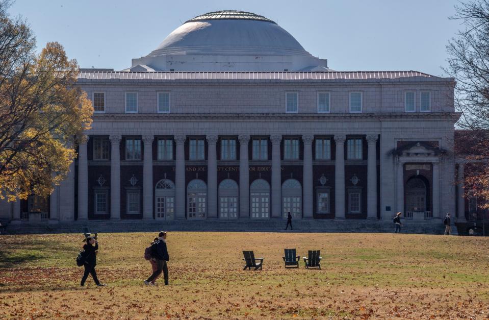 Students walk past the Faye and Joe Wyatt Center at Vanderbilt University in Nashville, Tenn., Monday, Nov. 27, 2023.