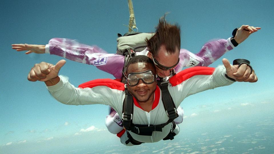 Myron Pitts doing a tandem skydiving jump with instructor Brian Quick in Hoke County in June of 2001.