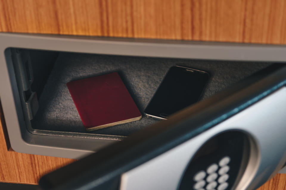 A close-up of a hotel safe with valuables