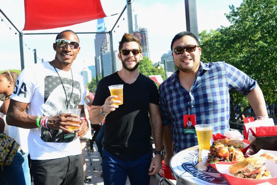 Bud & Burger judges, rugby player Perry Baker, singer Thomas Rhett, and chef David Chang attend the 2016 Budweiser Made in America Festival - Day 2 at Benjamin Franklin Parkway on September 4, 2016 (Getty Images for Anheuser-Busch)