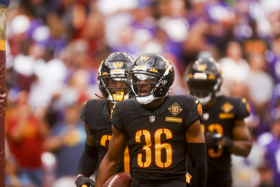 Washington Commanders cornerback Danny Johnson (36) celebrates his interception with his teammates during the first half of a NFL football game between the Washington Commanders and the Minnesota Vikings on Sunday, Nov. 6, 2022 in Landover, Md. (Shaban Athuman/Richmond Times-Dispatch via AP)