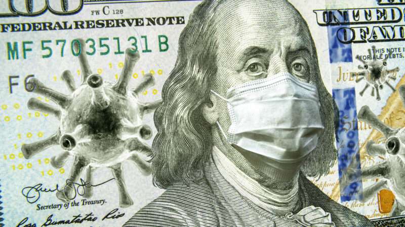 Close-up angle of a U.S. $100 bill, with coronavirus molecules and an N-95 mask over Ben Franklin's face.