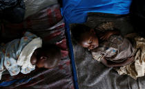 <p>Severely acute malnourished and internally displaced Congolese children wait to receive medical attention at the Tshiamala general referral hospital of Mwene Ditu in Kasai Oriental Province in the Democratic Republic of Congo, March 15, 2018. (Photo: Thomas Mukoya/Reuters) </p>