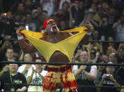 FILE - Hulk Hogan fires up the crowd between matches during WrestleMania 21 in Los Angeles, April 3, 2005. As WrestleMania approaches 40, it’s never been bigger.(AP Photo/Chris Carlson, File)