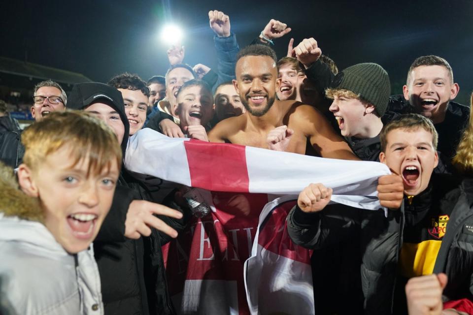 Alvechurch’s Danny Waldron celebrates with fans at the end of the FA Cup victory at Cheltenham (Adam Davy/PA). (PA Wire)