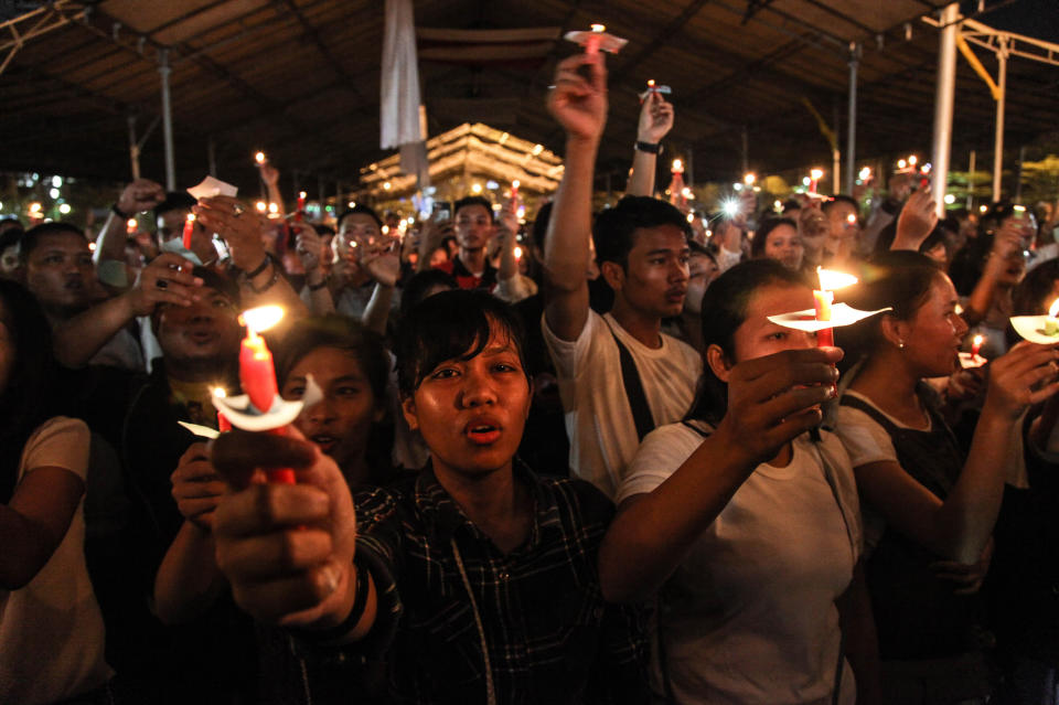 This picture taken on May 13, 2018 shows a candlelight vigil in the city of Medan on Indonesia's Sumatra island to support the victims and their relatives of a series attacks at churches in Surabaya, East Java.