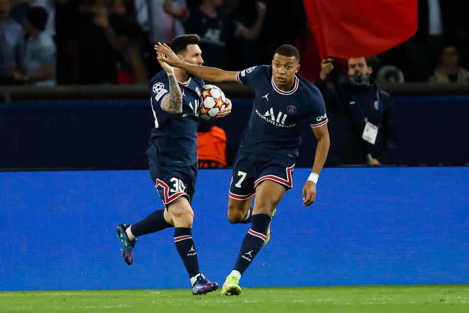 Lionel Messi (pictured left) celebrates his sides second goal with Kylian Mbappe (pictured right) against RB Leipzig at the Parc des Princes.