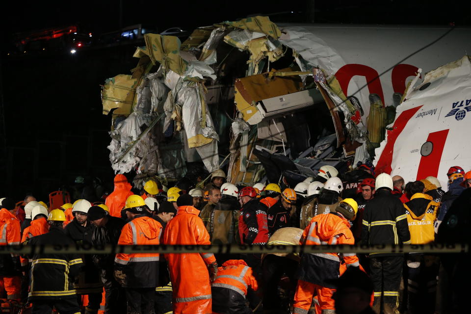 Rescue members and firefighters work after a plane skidded off the runway at Istanbul's Sabiha Gokcen Airport. Source: AP Photo/Emrah Gurel