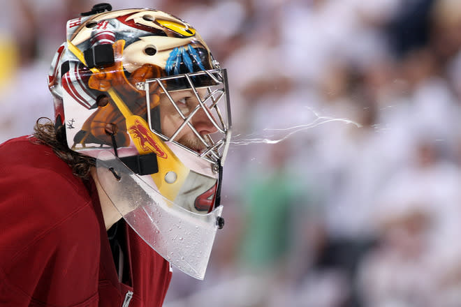 GLENDALE, AZ - MAY 22: Goaltender Mike Smith #41 of the Phoenix Coyotes spits in overtime while taking on the Los Angeles Kings in Game Five of the Western Conference Final during the 2012 NHL Stanley Cup Playoffs at Jobing.com Arena on May 22, 2012 in Phoenix, Arizona. (Photo by Christian Petersen/Getty Images)