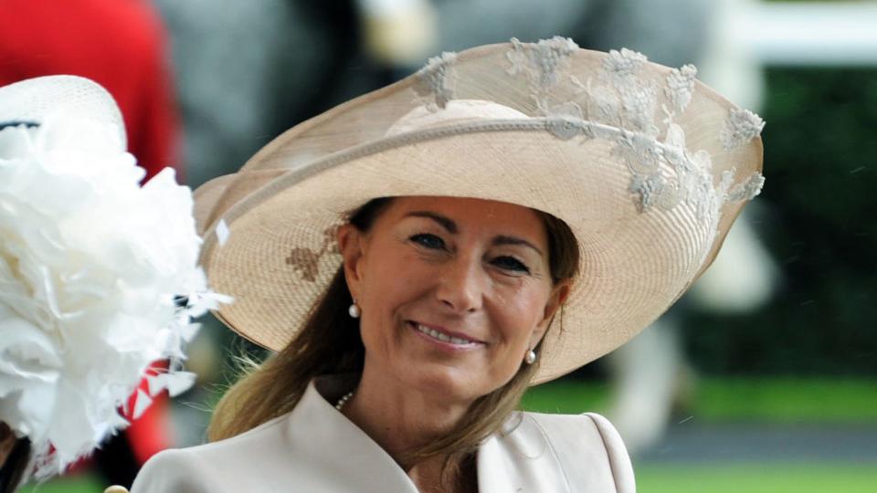 Carole Middleton arrives in the traditional carriage procession on Ladies Day at Royal Ascot on June 16, 2011