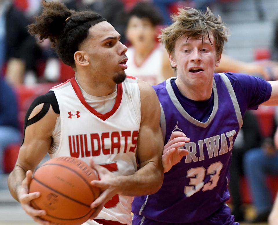 Canton South's Tavon Castle gets pressure from Triway's Drew Bishko in the second quarter of Triway at Canton South boys basketball. Tuesday, December 19, 2023.