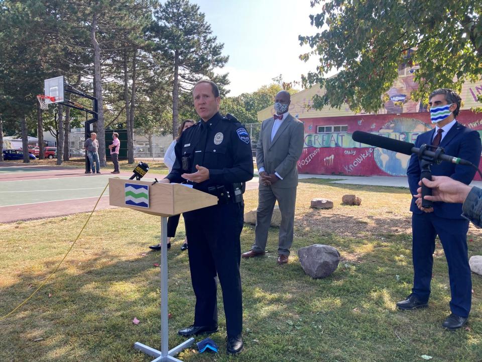 Acting Burlington Police Chief Jon Murad speaks at a news conference in Roosevelt Park on Sept. 25, 2020. Behind him stand Kyle Dodson, center, who had been hired as director of police transformation, and Mayor Miro Weinberger.