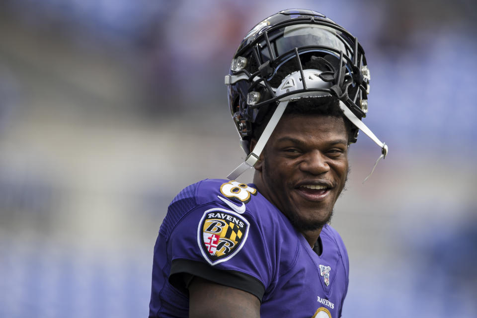 Lamar Jackson is staying in Baltimore. (Photo by Scott Taetsch/Getty Images)