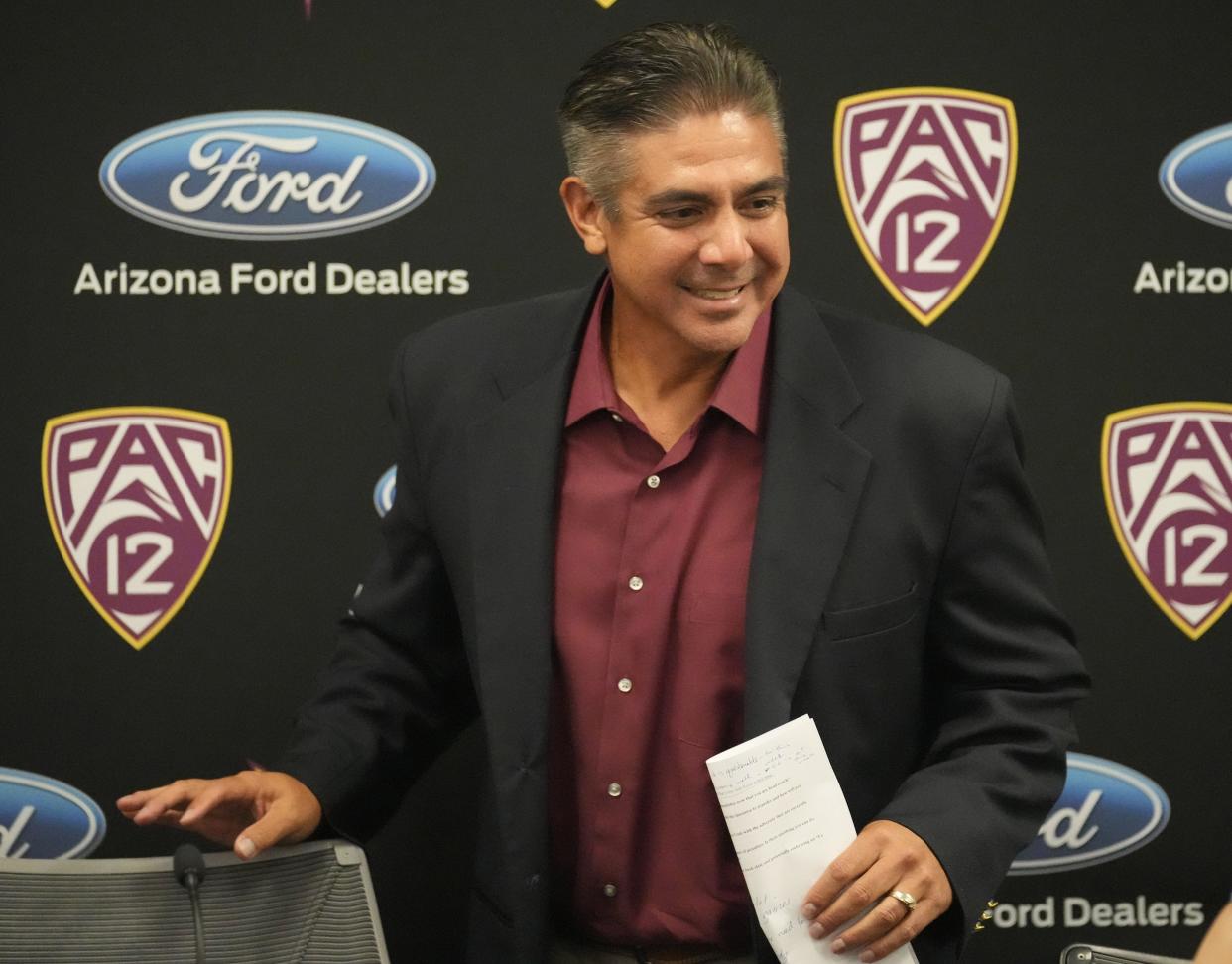 ASU interim head football coach Shaun Aguano smiles after an introductory news conference on Sept. 19, 2022. Aguano replaced Herm Edwards as head coach, who mutually agreed to part ways with the university.