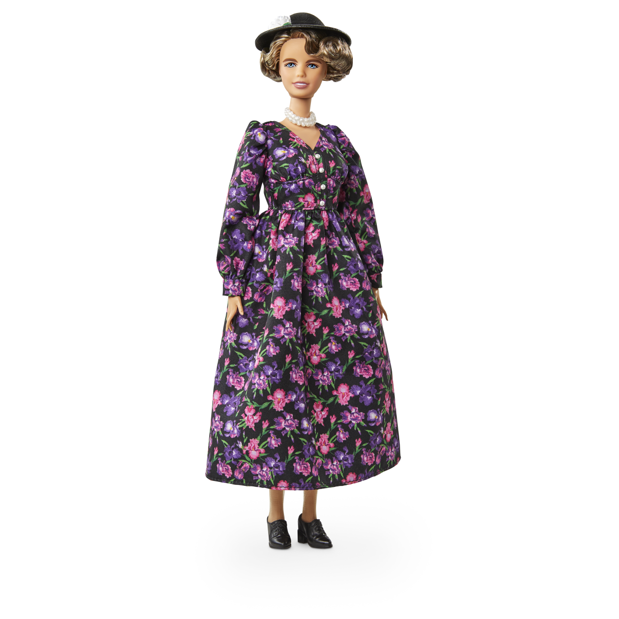 "The dress doesn’t make her look like toothpick! And [the hat] looks like one of the hats she wore," notes historian Allida Black. (Photo: Mattel)