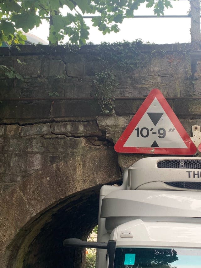 Lorry hits railway bridge