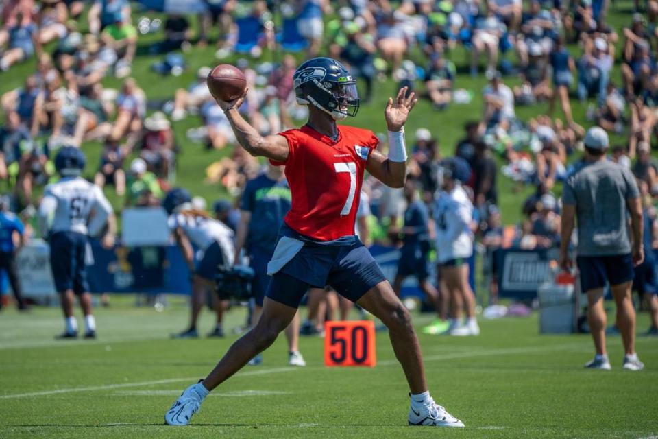 Seattle Seahawks quarterback Geno Smith works on his throwing passing to his teammates during the second day of Seahawks training camp at the Virginia Mason Athletic Center on July 28, 2022.