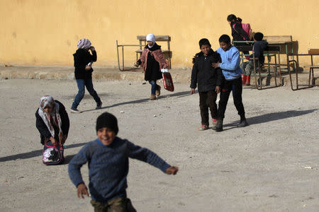 Students play at the 'Aisha Mother of the BelieversÕ school which was recently reopened after rebels took control of al-Rai town from Islamic State militants, Syria January 16, 2017. Picture taken January 16, 2017. To match story REUTERS/Khalil Ashawi