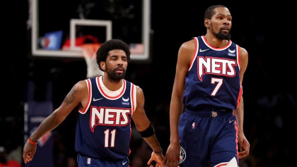 Apr 25, 2022; Brooklyn, New York, USA; Brooklyn Nets guard Kyrie Irving (11) and forward Kevin Durant (7) drop back on defense during the second quarter of game four of the first round of the 2022 NBA playoffs against the Boston Celtics at Barclays Center. Mandatory Credit: Brad Penner-USA TODAY Sports