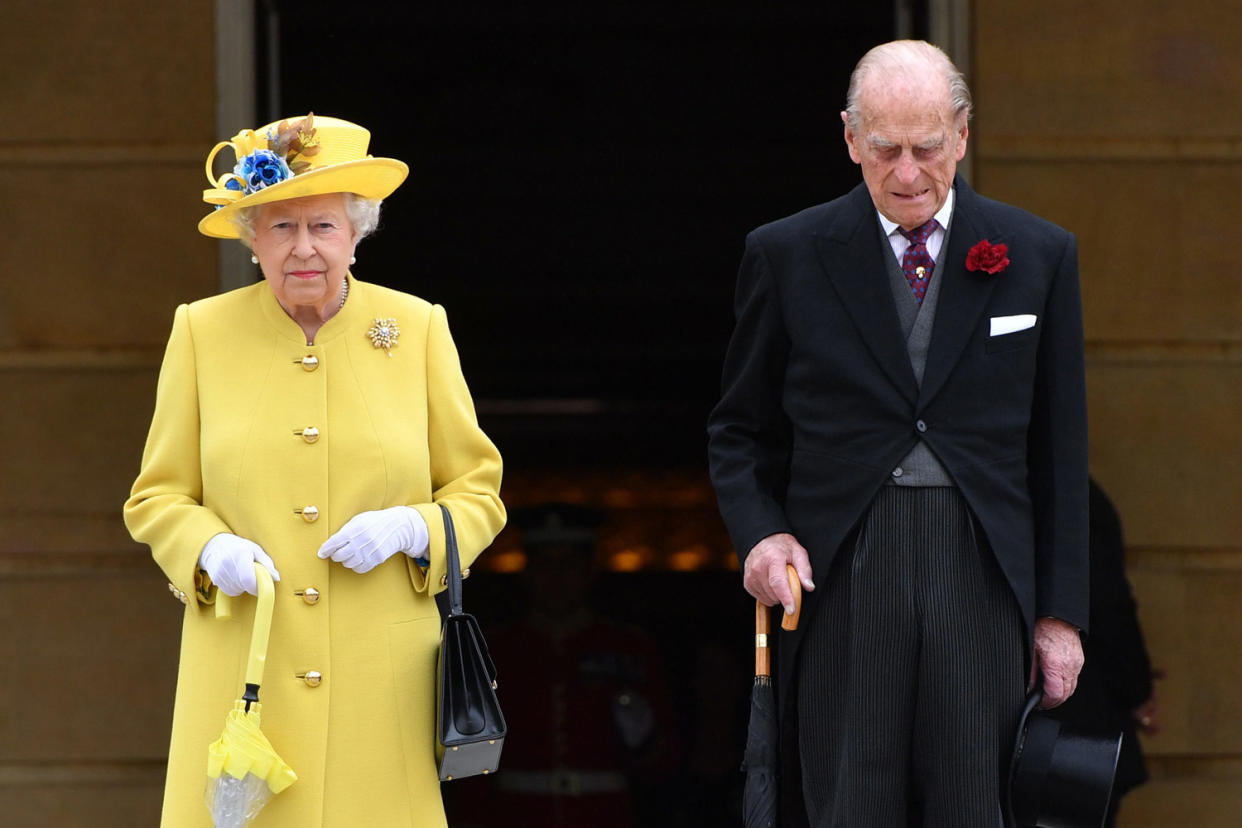 Tribute: The Queen and Prince Philip during the minute's silence: Dominic Lipinski/PA