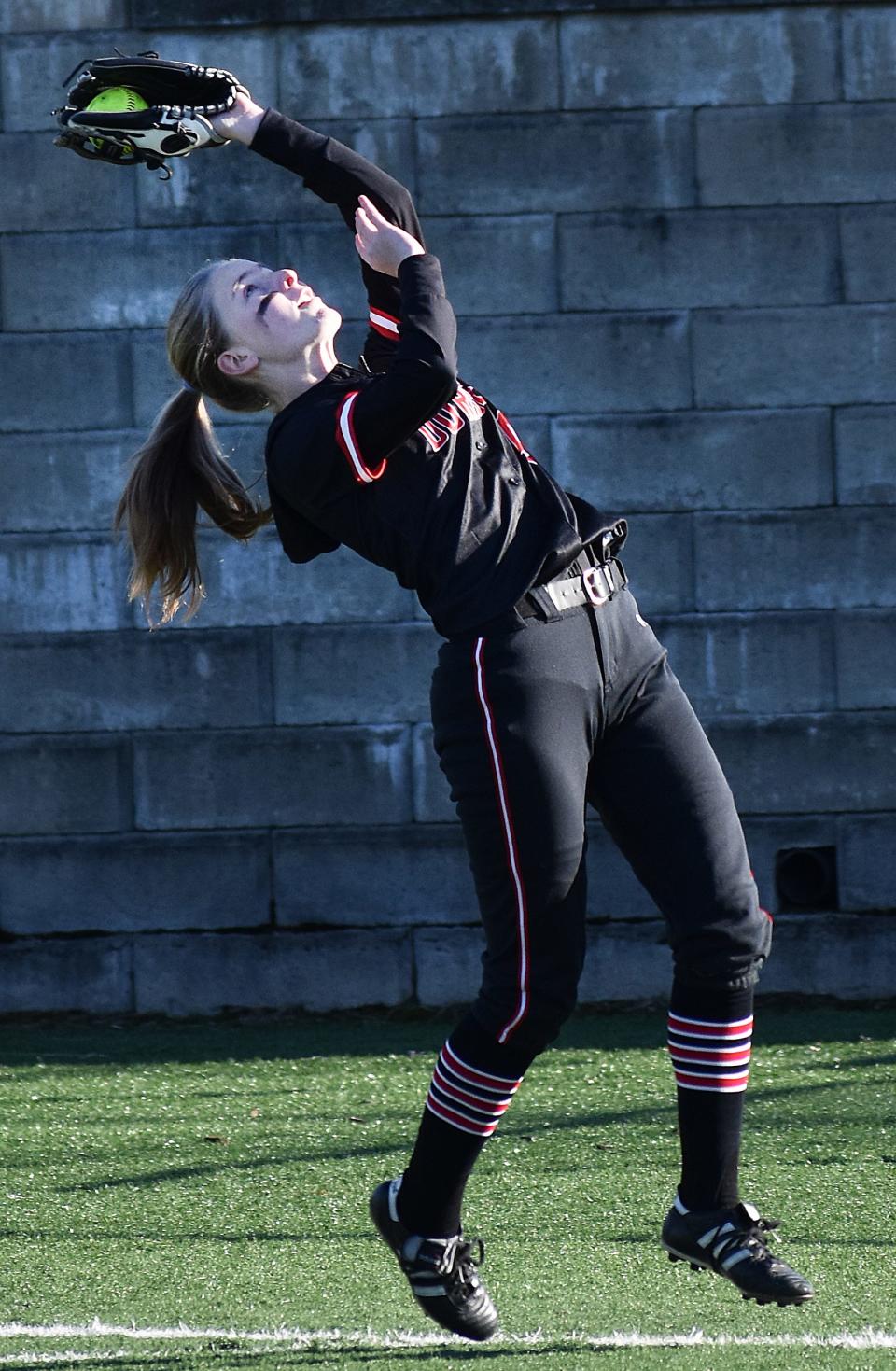 Durfee first baseman Katerina Rumsey catches a pop fly.