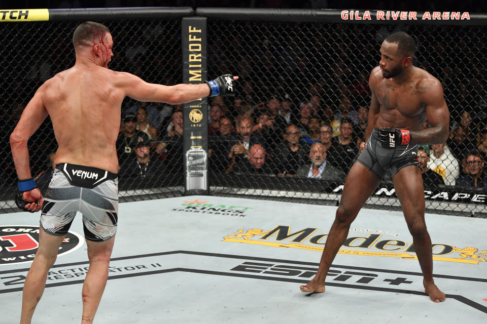 GLENDALE, ARIZONA - JUNE 12: (L-R) Nate Diaz taunts Leon Edwards of Jamaica in their welterweight fight during the UFC 263 event at Gila River Arena on June 12, 2021 in Glendale, Arizona. (Photo by Jeff Bottari/Zuffa LLC)