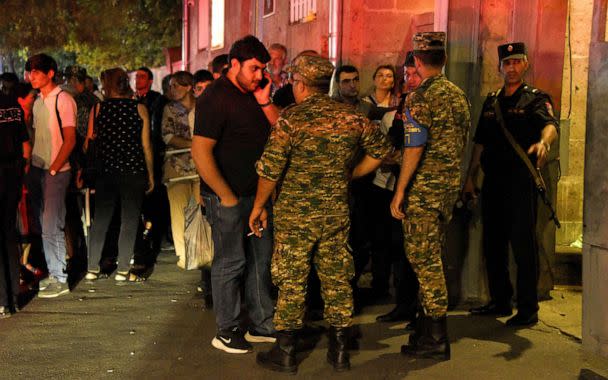 PHOTO: Relatives of servicemen, who were wounded in night border clashes between Armenia and Azerbaijan, gather outside a military hospital in Yerevan, Sept. 13, 2022. (Karen Minasyan/AFP via Getty Images)