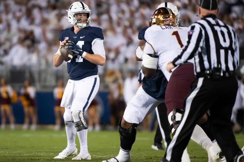 Penn State quarterback Sean Clifford stands in the pocket before completing a pass in the second quarter against Minnesota on Saturday, Oct. 22, 2022, in State College.