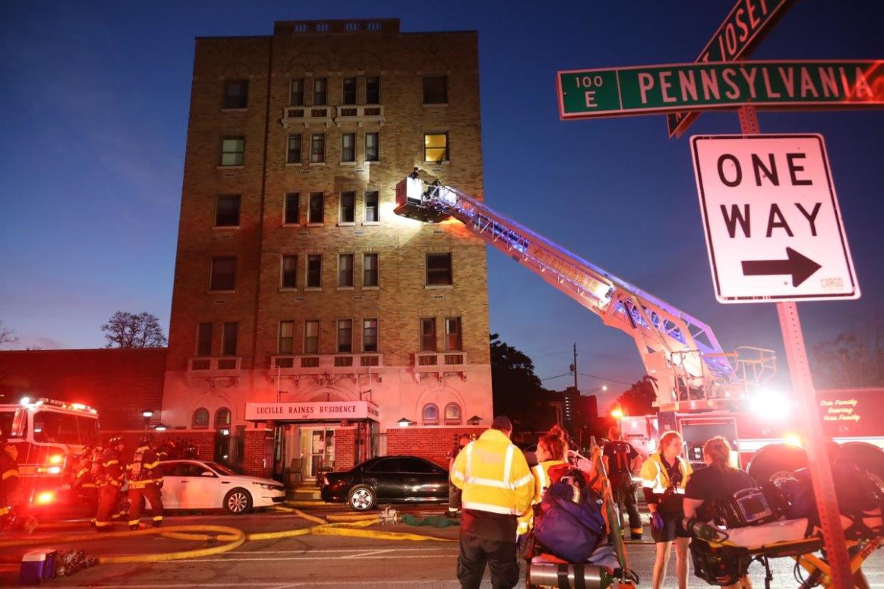 A woman died in a fire Sunday morning inside an apartment building in Downtown Indianapolis.