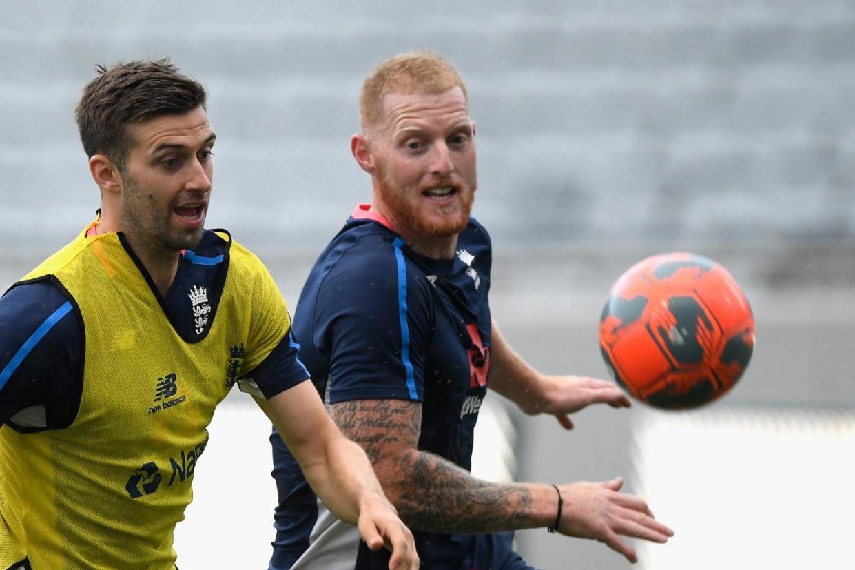 Whole new ball game: Mark Wood and Ben Stokes as they take part in a football match before training on Wednesday: Getty Images