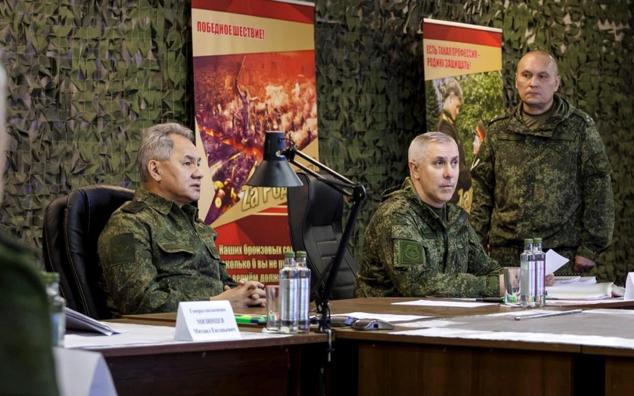 General Rustam Muradov, pictured, second right. - Rusian Defence Ministry Press Service