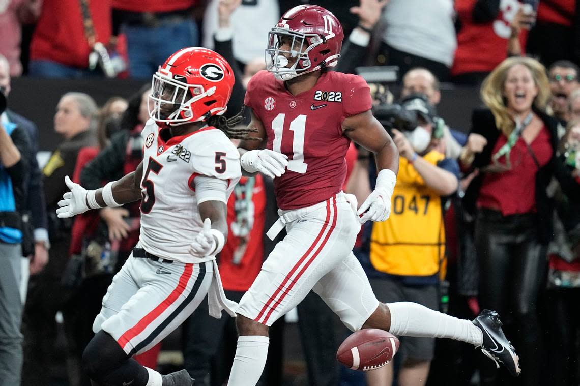 Georgia’s Kelee Ringo returns an interception for a touchdown during the second half of the College Football Playoff championship football game against Alabama Monday, Jan. 10, 2022, in Indianapolis. (AP Photo/Darron Cummings)