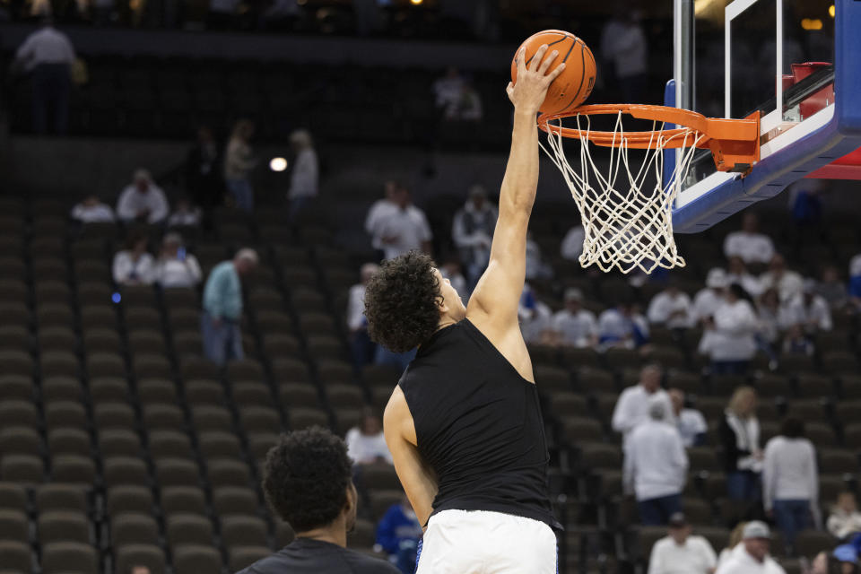 Creighton's Josiah Dotzler warms up before playing against Marquette in an NCAA college basketball game Saturday, March 2, 2024, in Omaha, Neb. (AP Photo/Rebecca S. Gratz)