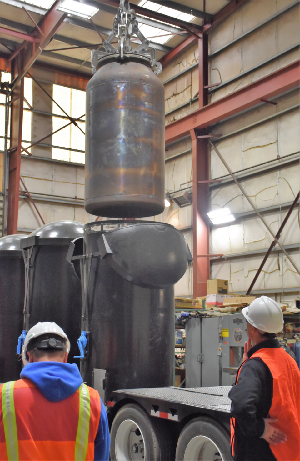 A waste container filled with non-radioactive test glass will be placed inside a pallet before being shipped off Hanford for disposal.