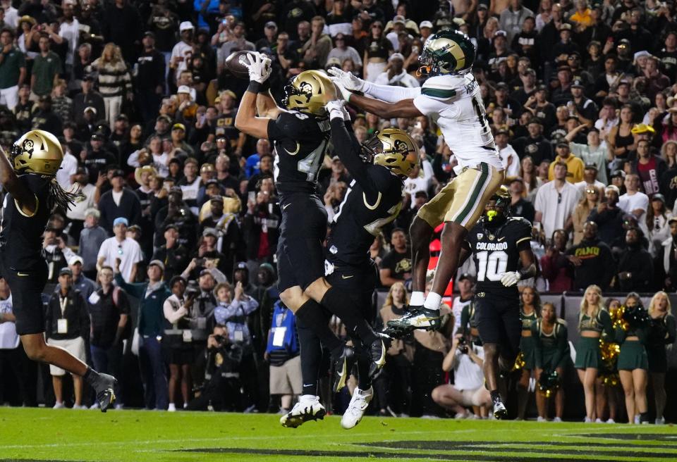 Colorado Buffaloes safety Trevor Woods (43) intercepts the ball to end the double overtime game against the Colorado State Rams at Folsom Field on Sept. 16, 2023, in Boulder.