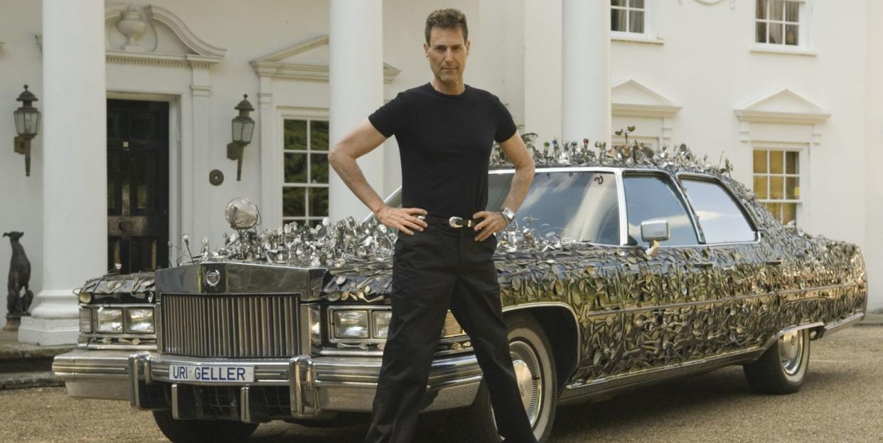 uri geller at home berkshire england 2008 uri with his custom built 1976 cadillac encrusted with over 5,000 pieces of contorted and bend spoons and cutlery