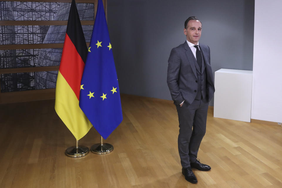 Germany's Foreign Minister Heiko Maas waits prior to a meeting with European Council President Charles Michel at the Europa building in Brussels, Monday, Jan. 20, 2020. (Yves Herman, Pool Photo via AP)