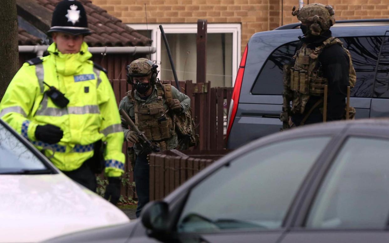 Heavily armed police took part in the raid in the centre of Newcastle - Credit: NCJ Media