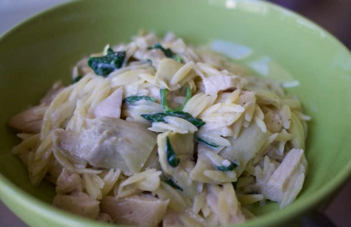 <p>The Food Hunter</p><p>Similar to mac and cheese, this nourishing recipe is deliciously combines artichokes, spinach, chicken and orzo pasta.</p><p><strong>Get the recipe:</strong> <a href="http://www.foodhuntersguide.com/2015/08/creamy-parmesan-orzo-pasta-with-chicken.html" rel="nofollow noopener" target="_blank" data-ylk="slk:Creamy Parmesan Orzo Pasta With Chicken Artichokes and Spinach;elm:context_link;itc:0;sec:content-canvas" class="link rapid-noclick-resp"><strong>Creamy Parmesan Orzo Pasta With Chicken Artichokes and Spinach </strong></a></p>