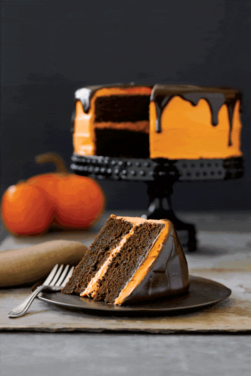 <p>Canned pumpkin adds a delicious fall twist to a class chocolate cake. </p><p><strong><em><a href="https://www.womansday.com/food-recipes/food-drinks/recipes/a18457/chocolate-pumpkin-cake-clv0907/" rel="nofollow noopener" target="_blank" data-ylk="slk:Get the Halloween Chocolate Pumpkin Cake recipe.;elm:context_link;itc:0;sec:content-canvas" class="link ">Get the Halloween Chocolate Pumpkin Cake recipe. </a></em></strong></p>