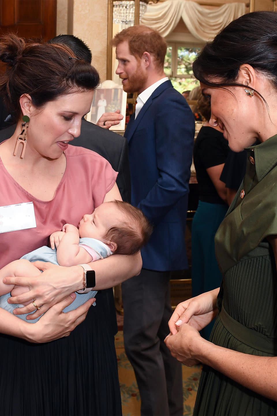 <p>Meghan meets a baby.</p>