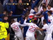 Everton fan appears to throw punch at Lyon player while holding child during fight triggered by Ashley Williams tackle